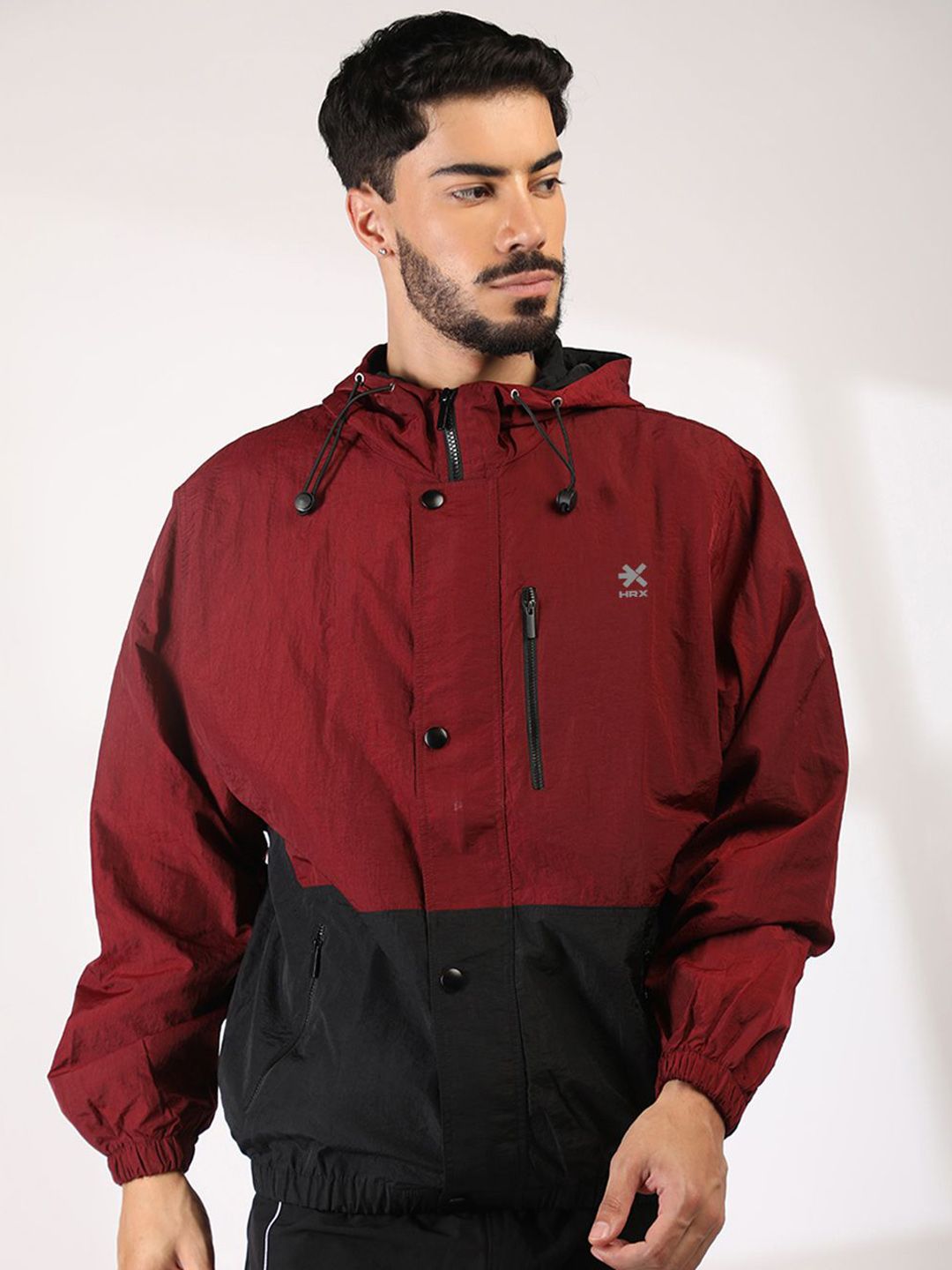 HRX by Hrithik Roshan Men Hooded Colourblocked Windcheater Sporty Jacket
