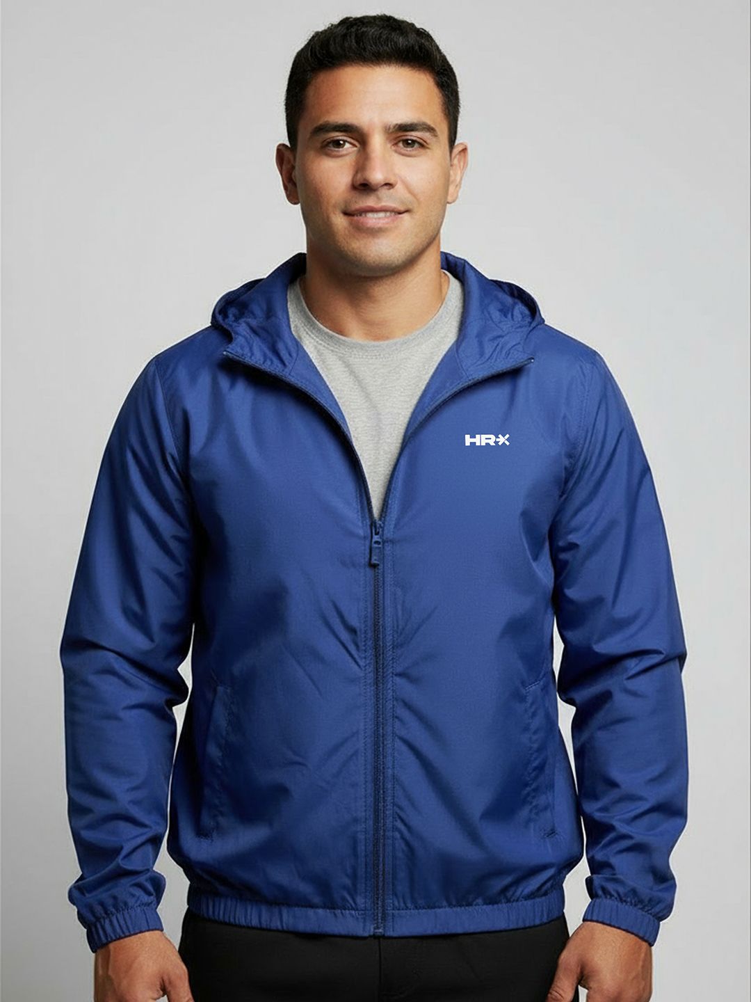 HRX by Hrithik Roshan Men Hooded Solid Windcheater Sporty Jacket