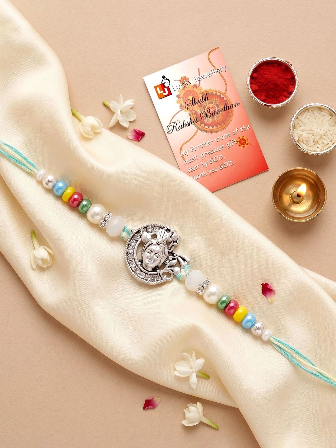 LUCKY JEWELLERY Silver Tone Bal Gopal Krishna Beaded Rakhi with Roli Chawal & Card