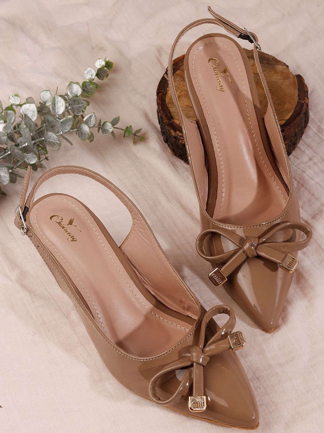 CHINRAAG Slim Heeled Pumps with Bows