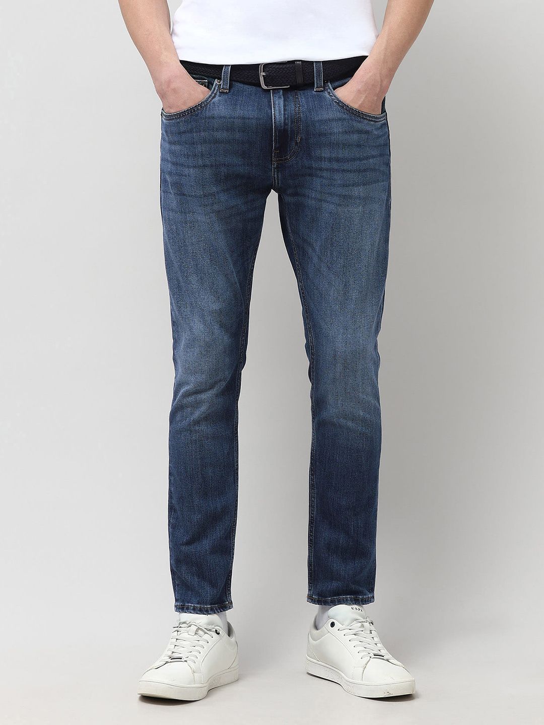 U.S. Polo Assn. Denim Co. Men Tapered Fit Mid-Rise Heavy Fade Stretchable Jeans