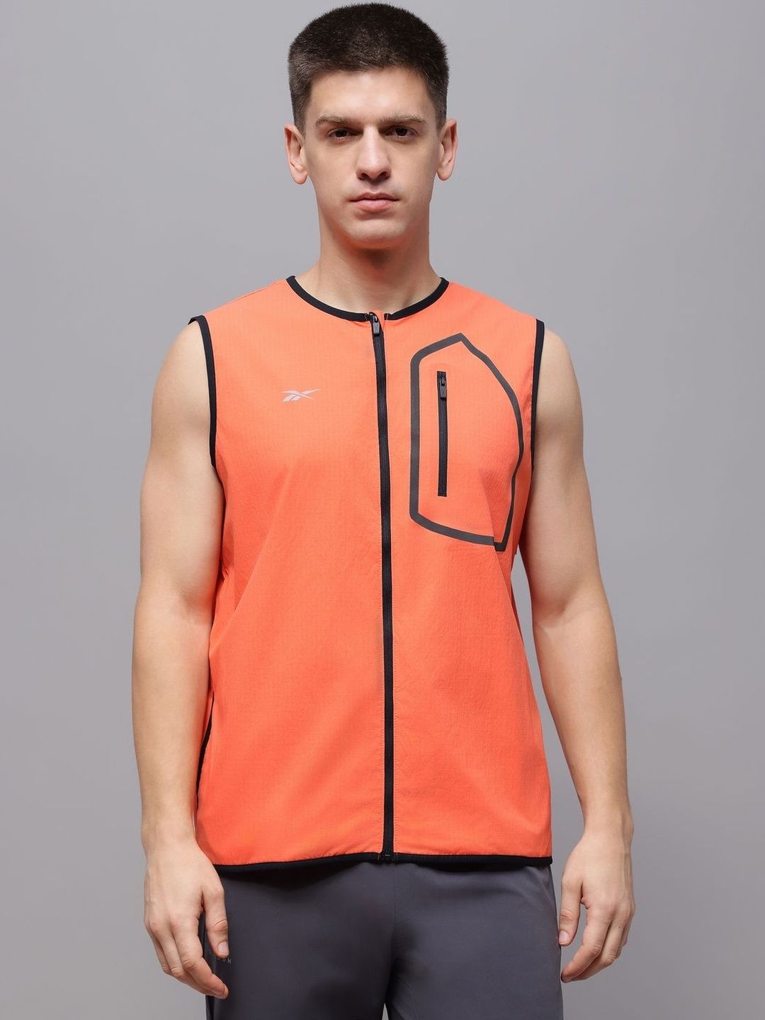 Reebok Collarless Open Front Jacket