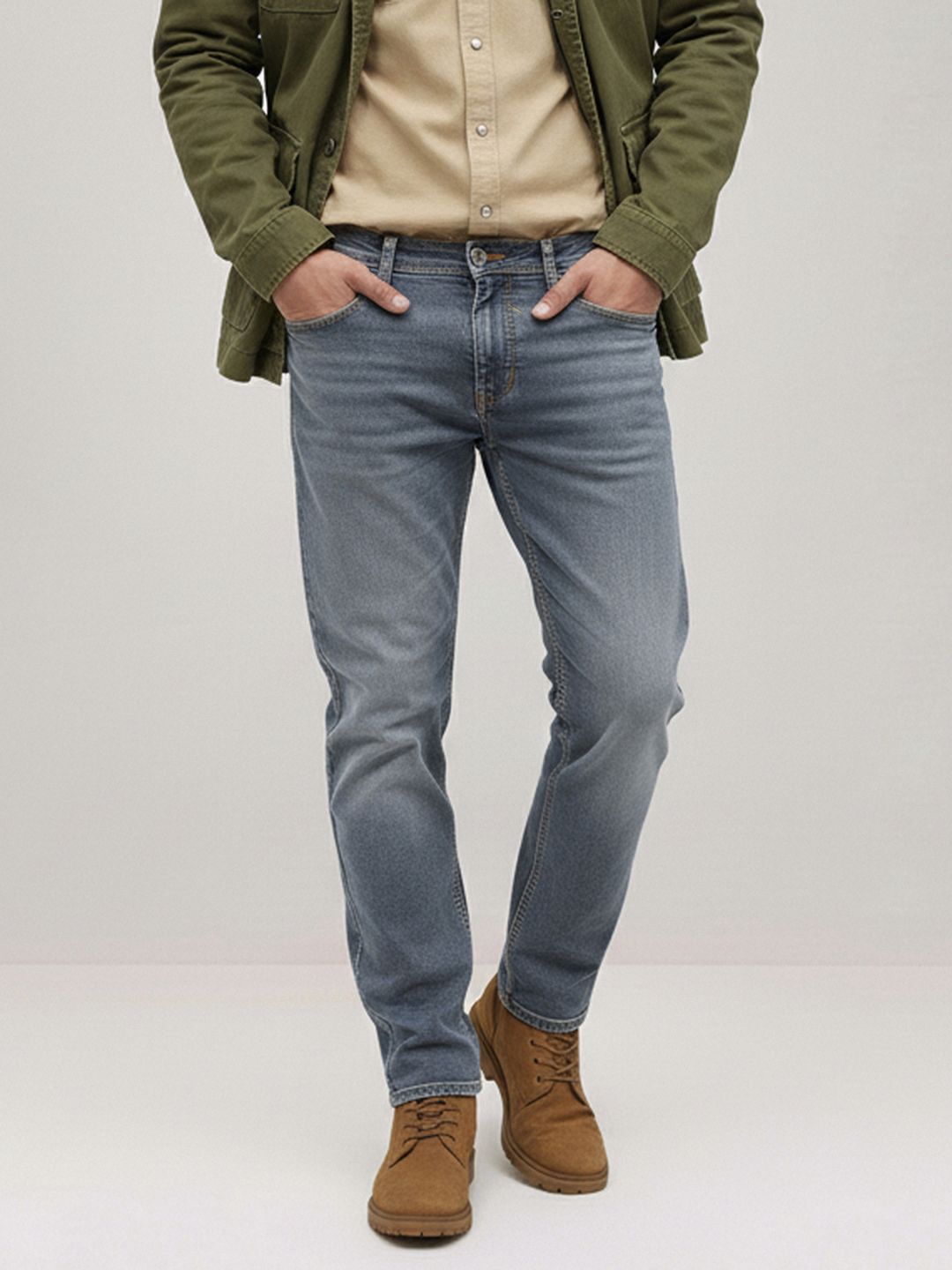 The Roadster Life Co. Men Slim Fit Mid-Rise Light Fade Stretchable Jeans With Bag