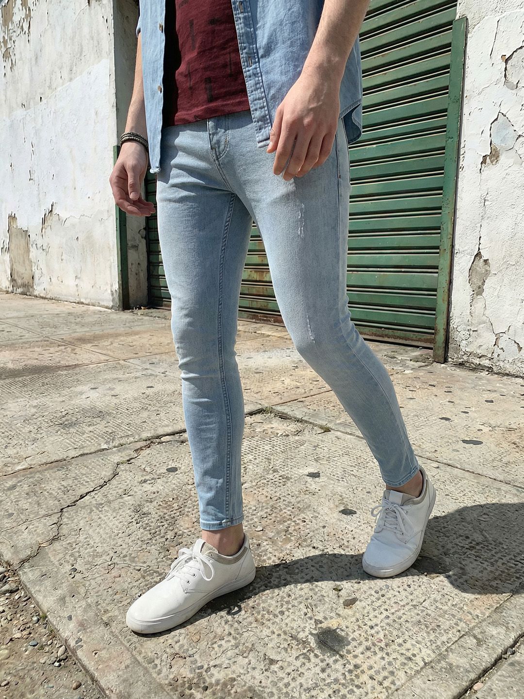 Roadster Men Blue Super Skinny Fit Mid-Rise Mildly Distressed Stretchable Jeans