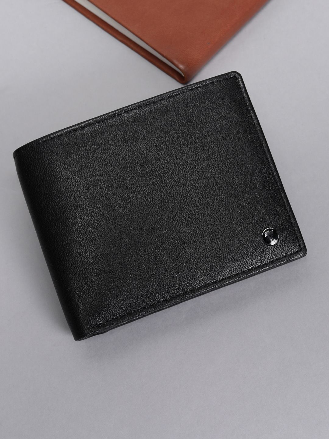 Van Heusen Men Leather Wallets deal from myntra