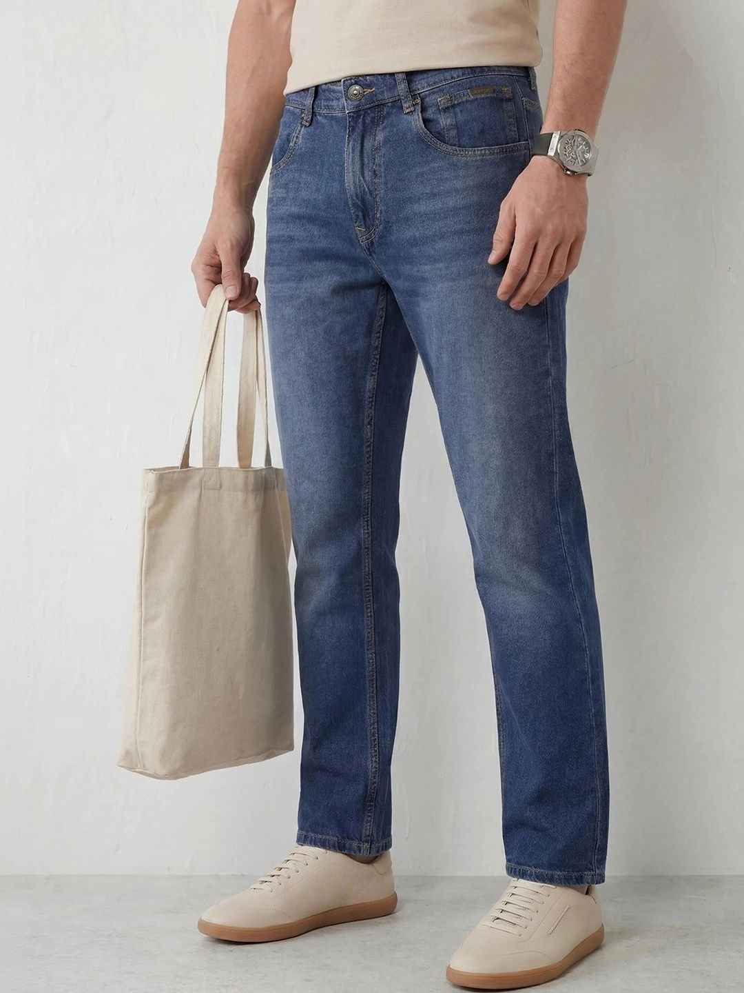 WROGN Men Anti Relaxed Fit Mid-Rise Light Fade Stretchable Jeans