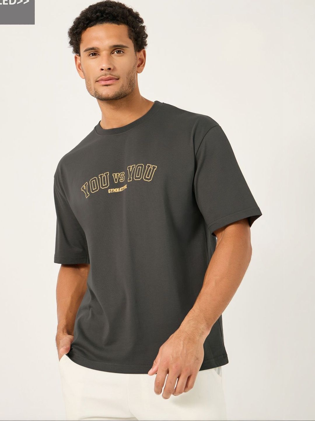Styli Men Oversized Varsity Slogan T-Shirt