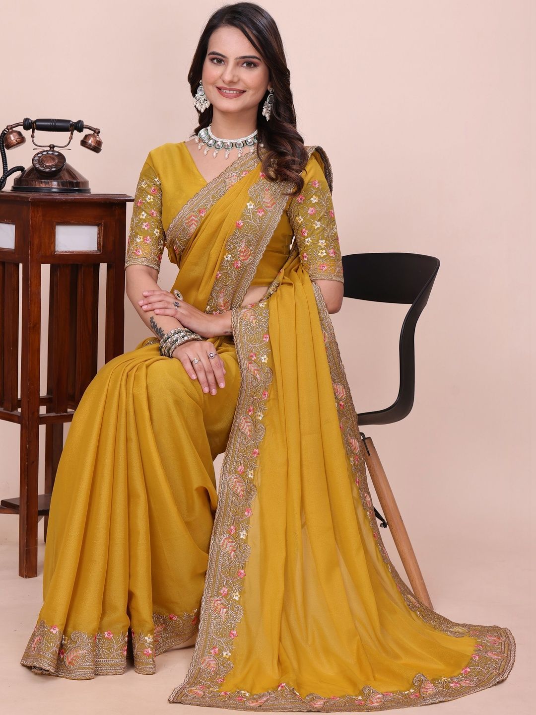 Saanvi Floral Embroidered Poly Georgette Heavy Work Saree