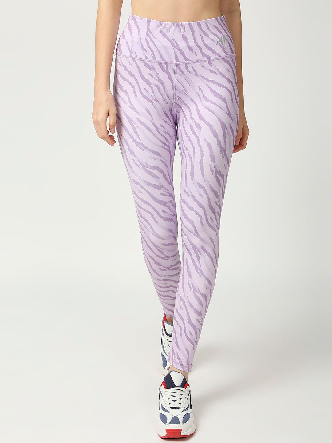 AESTHETIC NATION Women Lavender Printed Dry Fit Tights Price in India