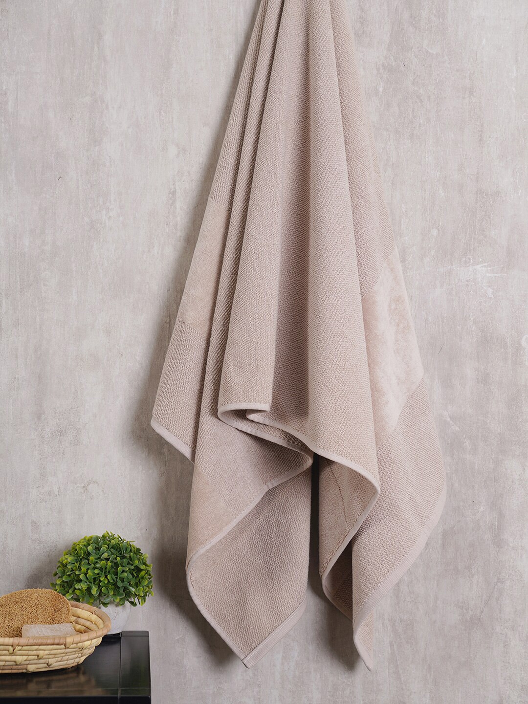Pure Home and Living Beige Solid Cotton 600 GSM Bath Towel Price in India