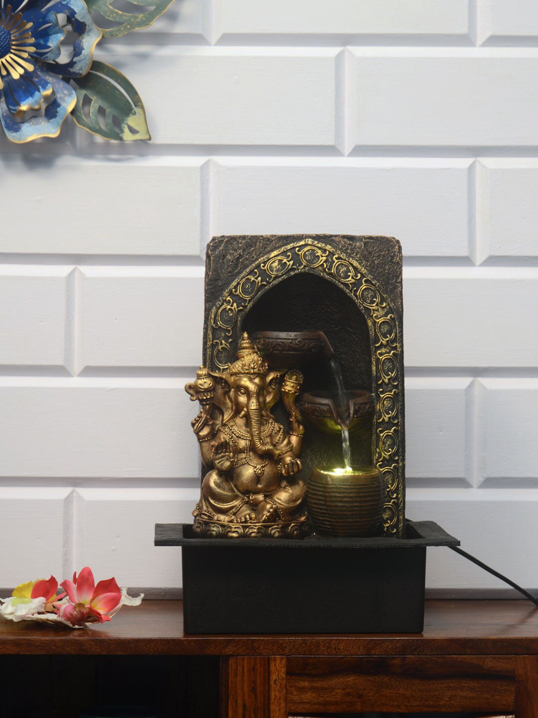 Athome by Nilkamal Gold-Toned  Ganesh Divine Pot Water Fountain Price in India