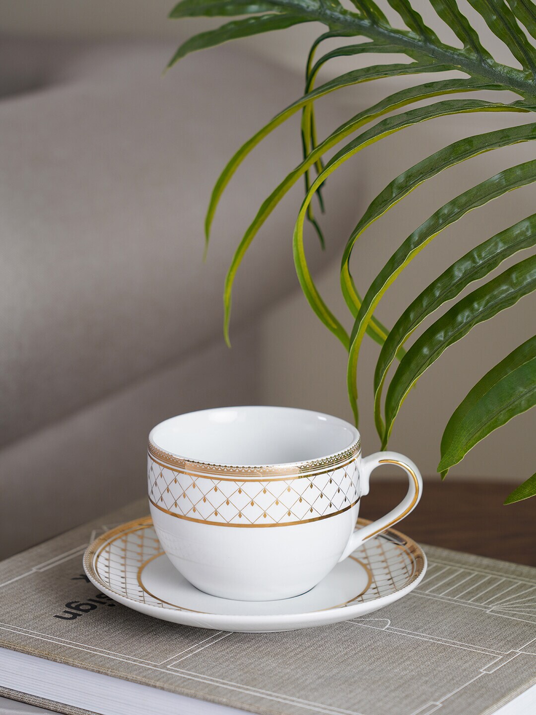 Pure Home and Living White & Orange Printed Porcelain Glossy Cups and Saucers Set of Cups and Mugs Price in India