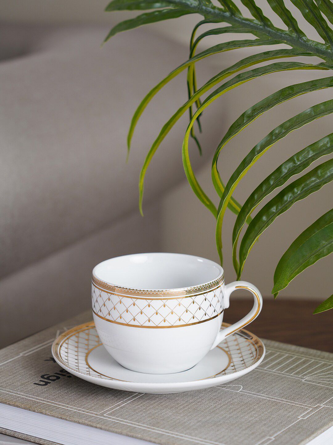 Pure Home and Living White & Orange Printed Porcelain Glossy Cups and Saucers Set of Cups and Mugs Price in India