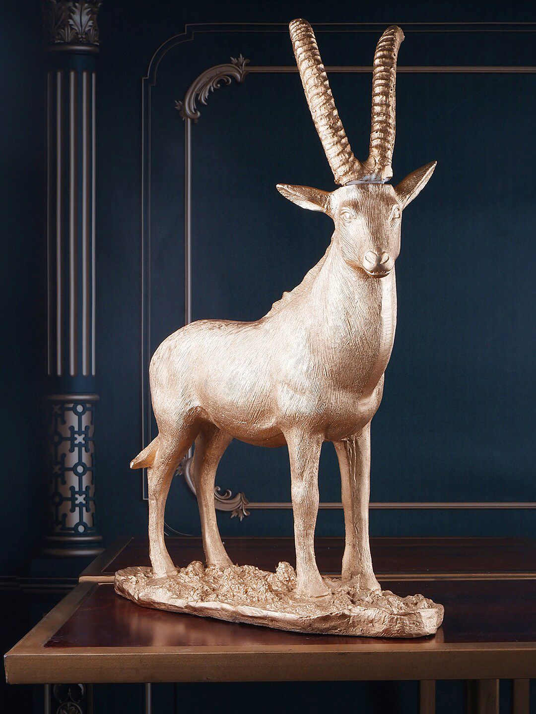 THE WHITE INK DECOR Gold-Toned Solid Antique Deer Showpiece Price in India