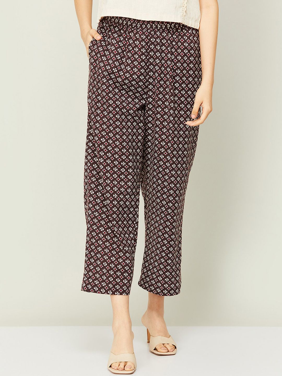 Melange by Lifestyle Women Black Printed Tapered Fit Trousers Price in India