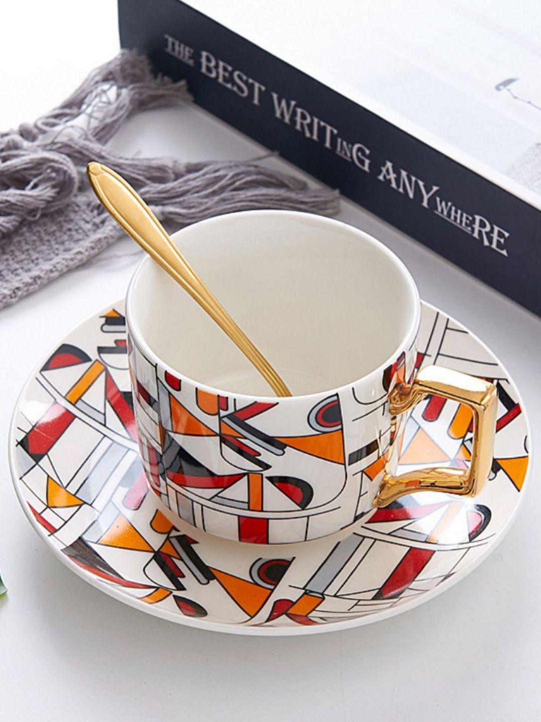 Nestasia White and Red Abstract Ceramic Glossy Cup and Saucer Set Price in India