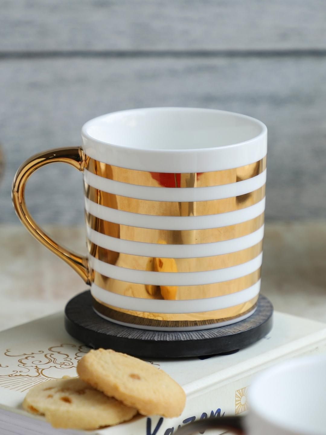 Nestasia White & Gold-Toned Printed Ceramic Glossy Mug Price in India