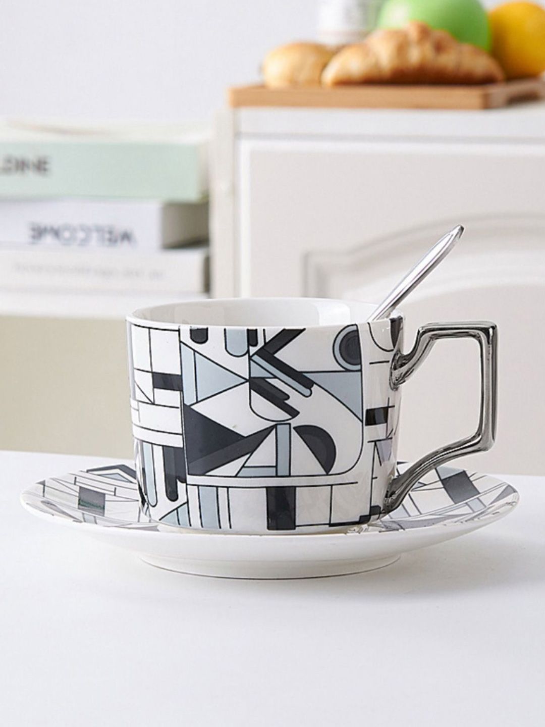 Nestasia White & Grey Printed Ceramic Glossy Cups and Saucer Set Price in India
