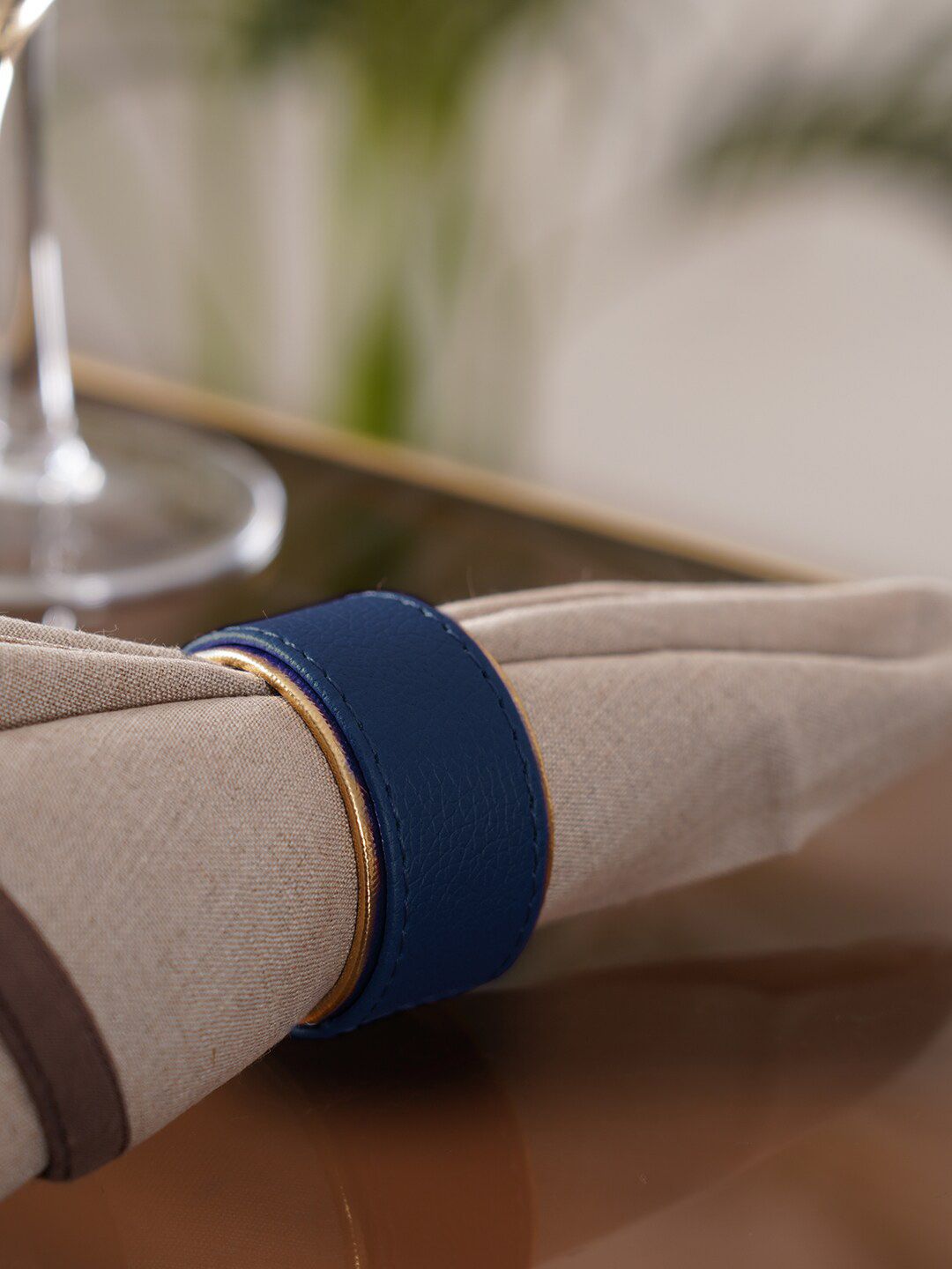 Pure Home and Living Set Of 4  Blue & Gold-Toned Solid Table Napkins Rings Price in India
