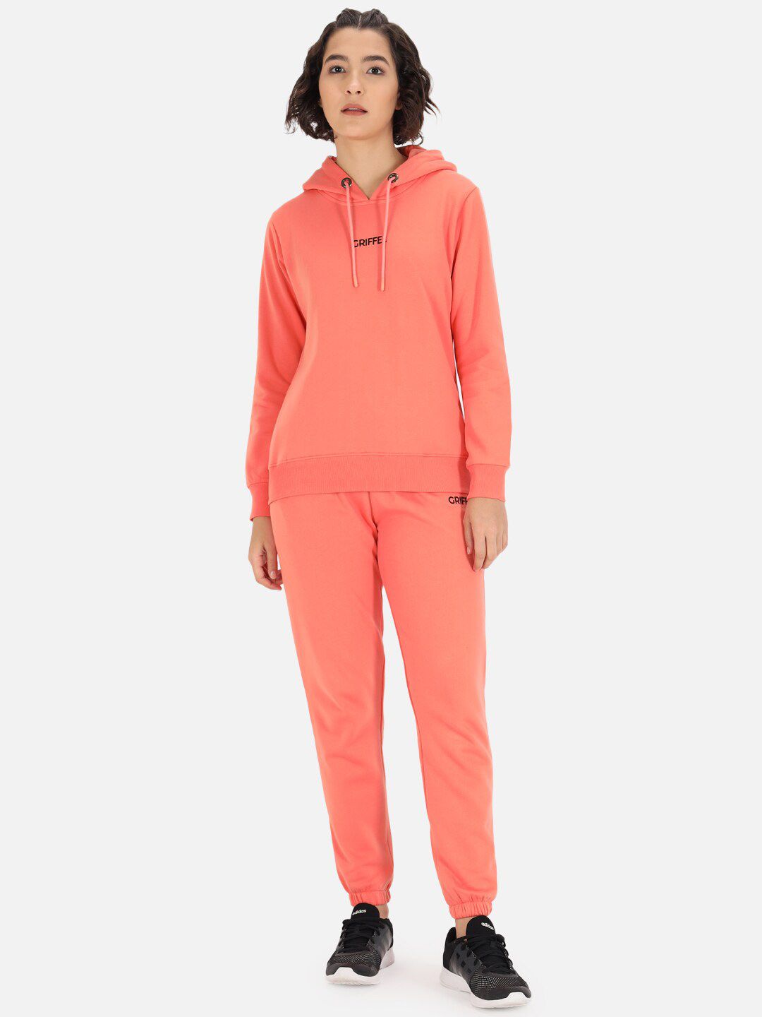 GRIFFEL Women Peach Solid Tracksuit Price in India