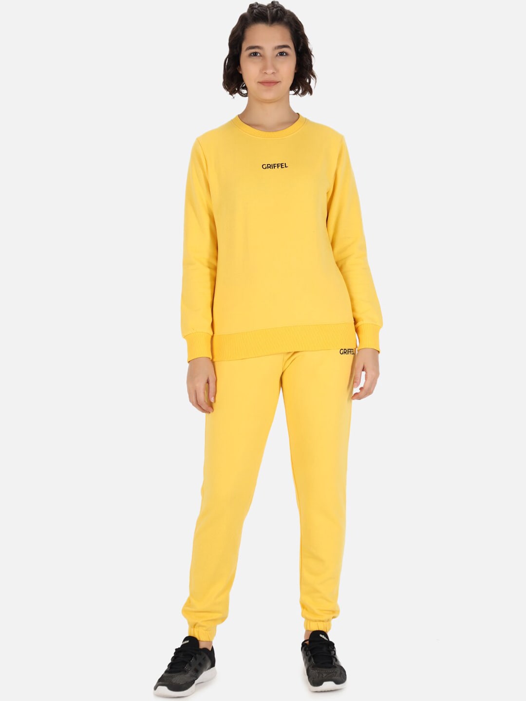 GRIFFEL Women Yellow Solid Tracksuits Price in India