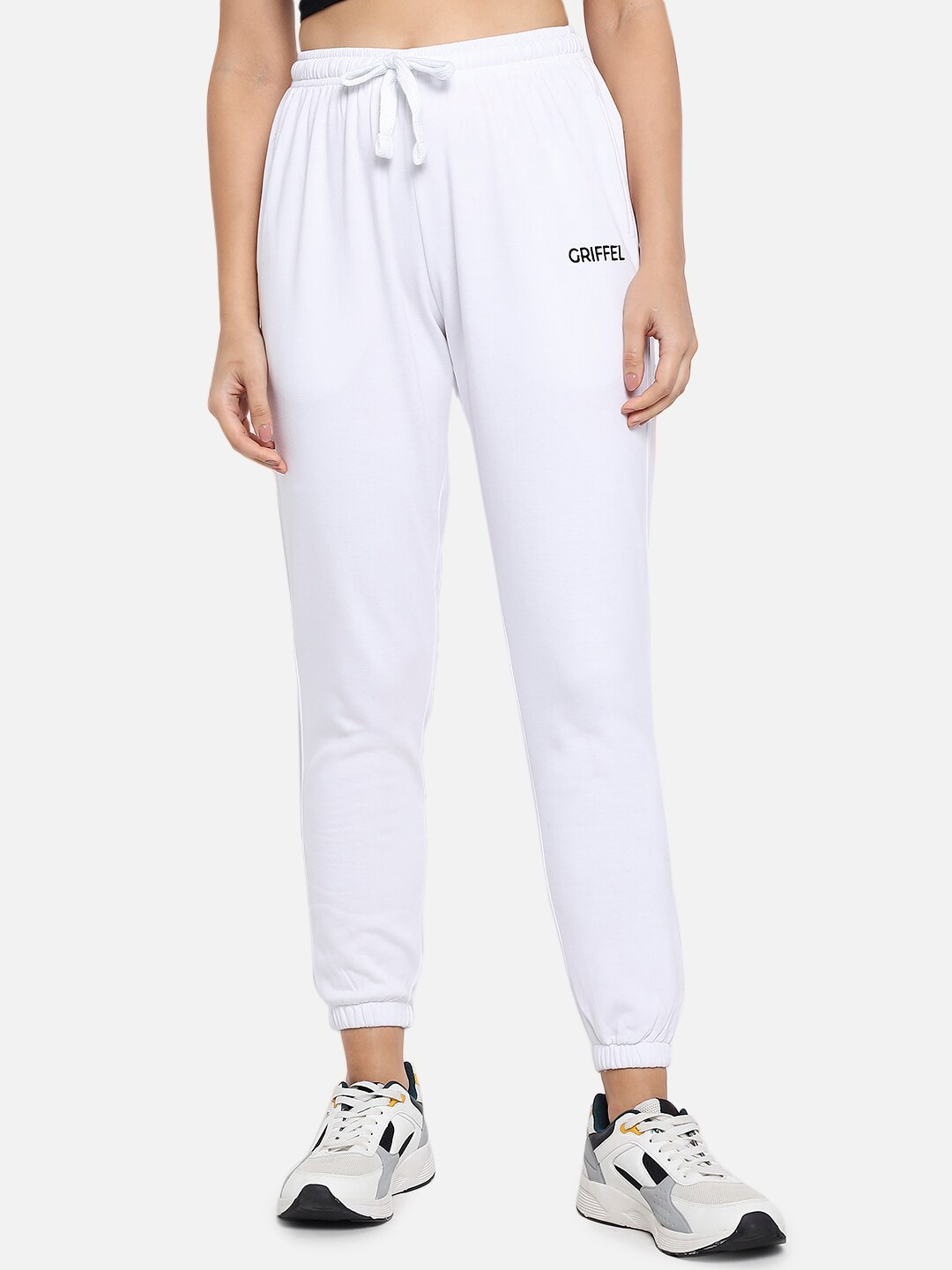 GRIFFEL Women White Solid Cotton Joggers Price in India