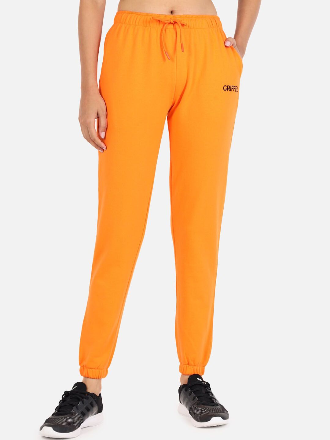 GRIFFEL Women Orange Solid Sports Cotton Joggers Price in India