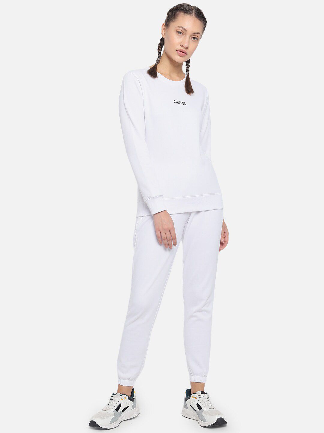 GRIFFEL Women White Solid Sports Tracksuit Price in India