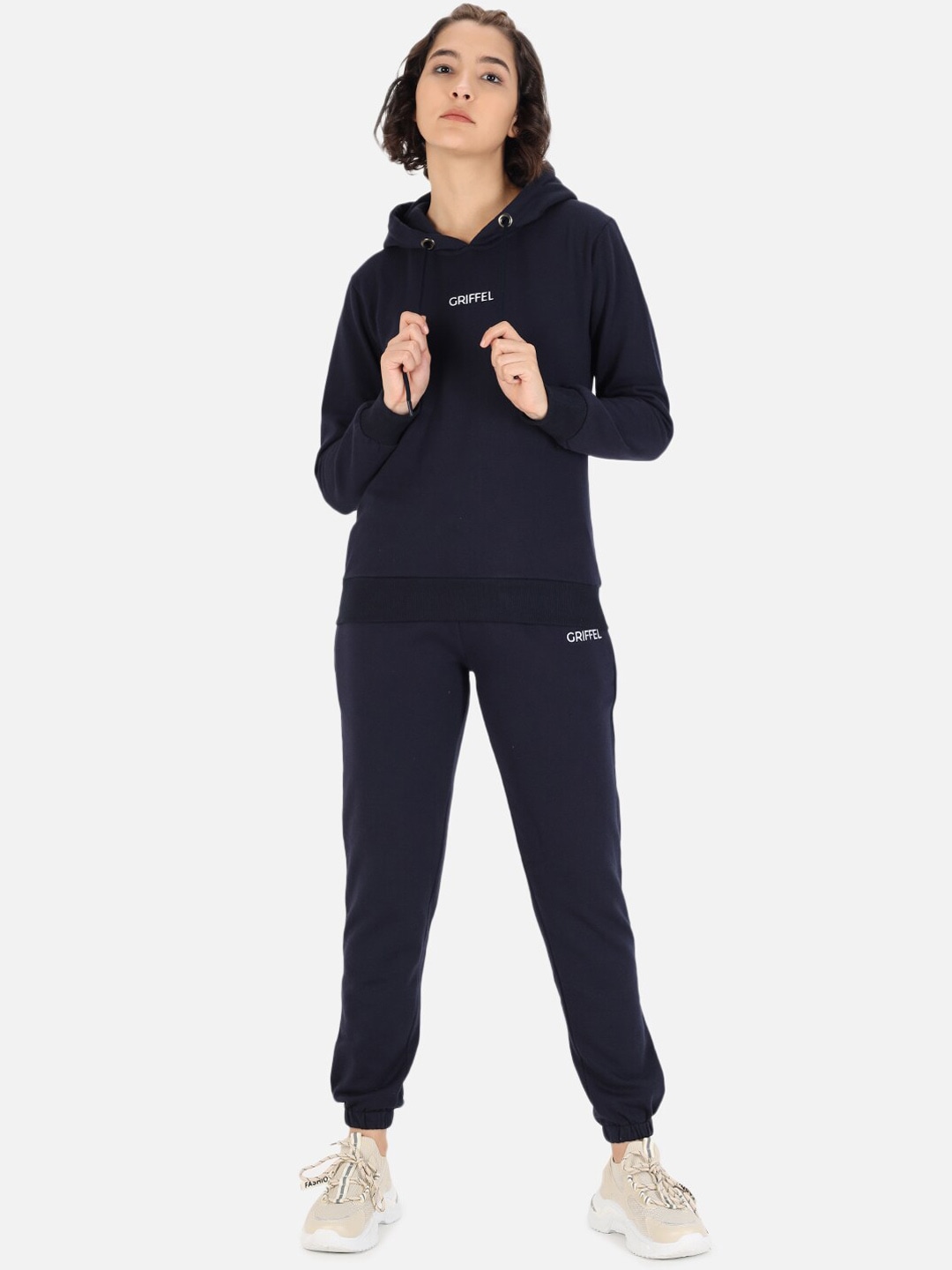 GRIFFEL Women Navy Blue Solid Sports Tracksuit Price in India