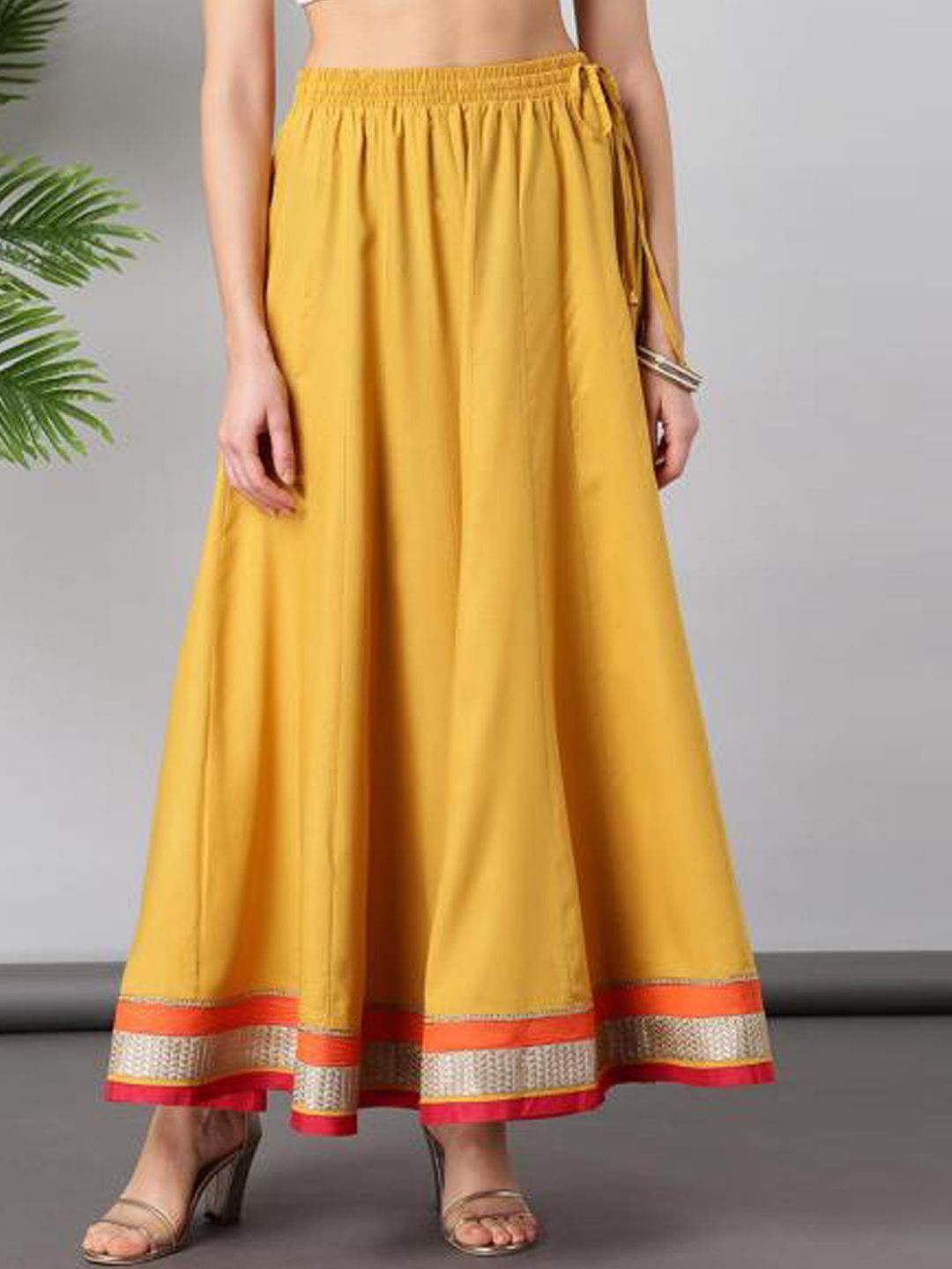 Lakshita Women Yellow Solid Flared Maxi Skirt Price in India