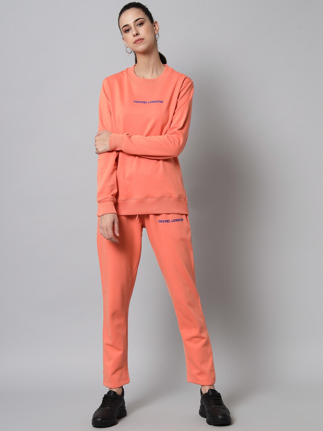 GRIFFEL Women Peach & Blue Logo Printed Cotton Fleece Tracksuit Price in India
