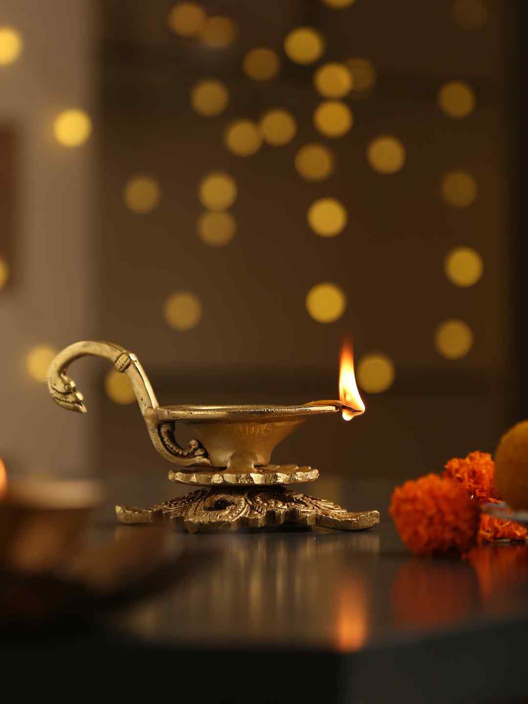 Amoliconcepts Gold-Toned Diya with Handle & Intricate Base Price in India