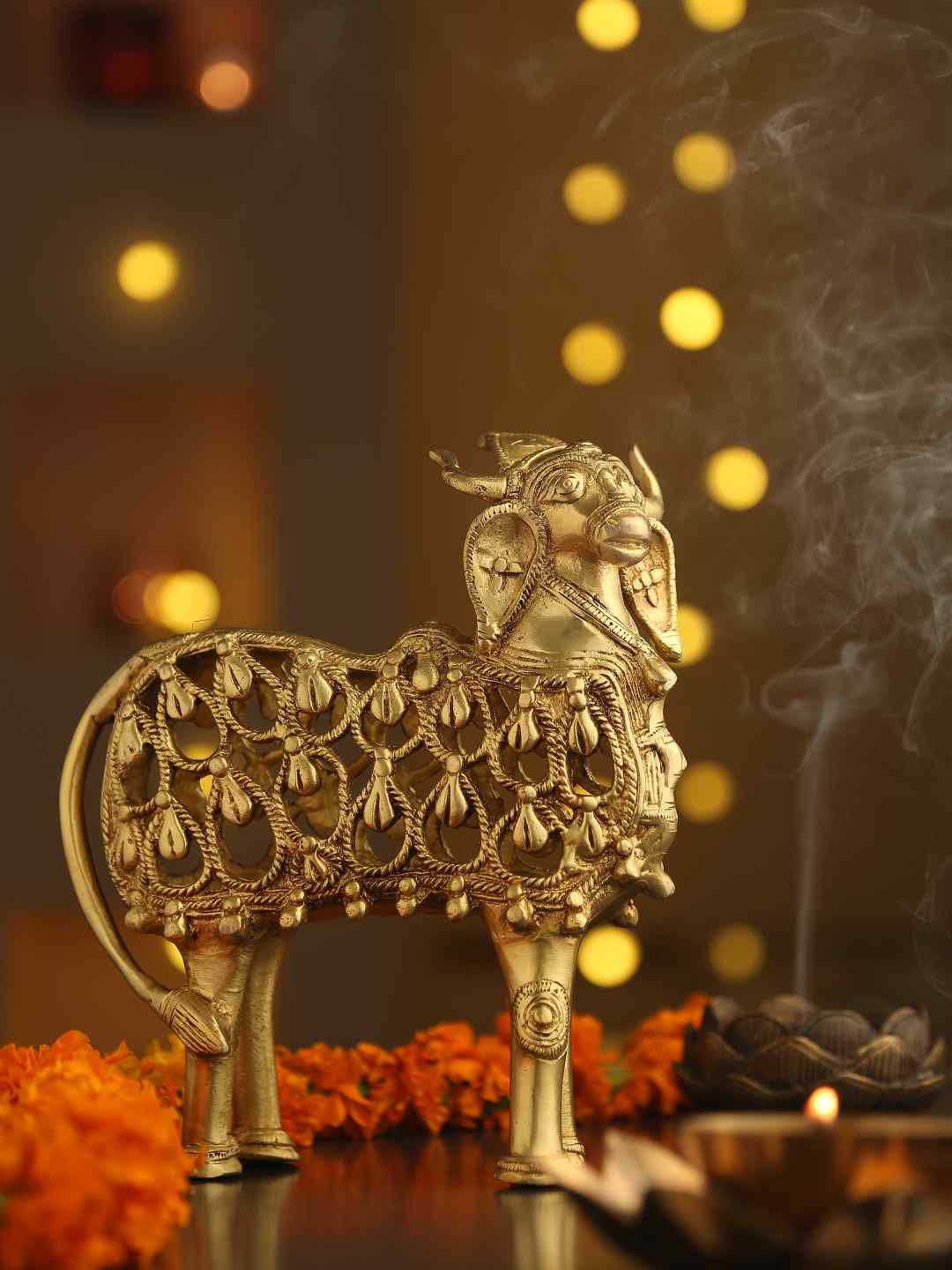 Amoliconcepts Gold-Toned Cow Figurine Showpiece Price in India