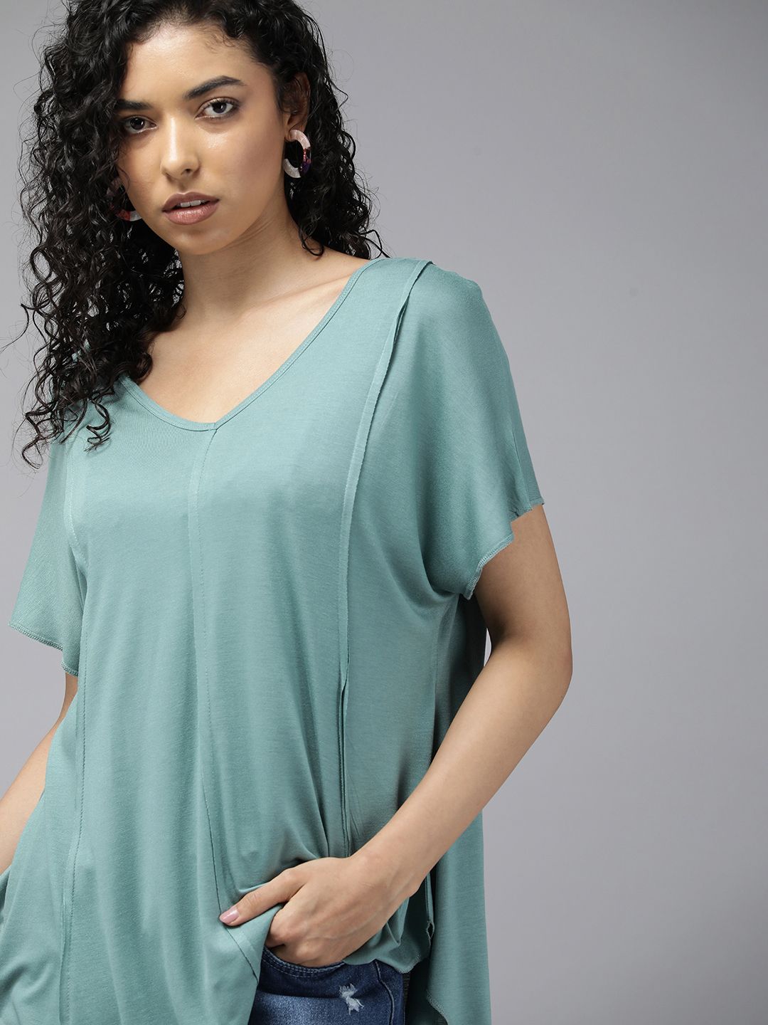 The Roadster Lifestyle Co. Solid V Neck Extended Sleeves Top Price in India