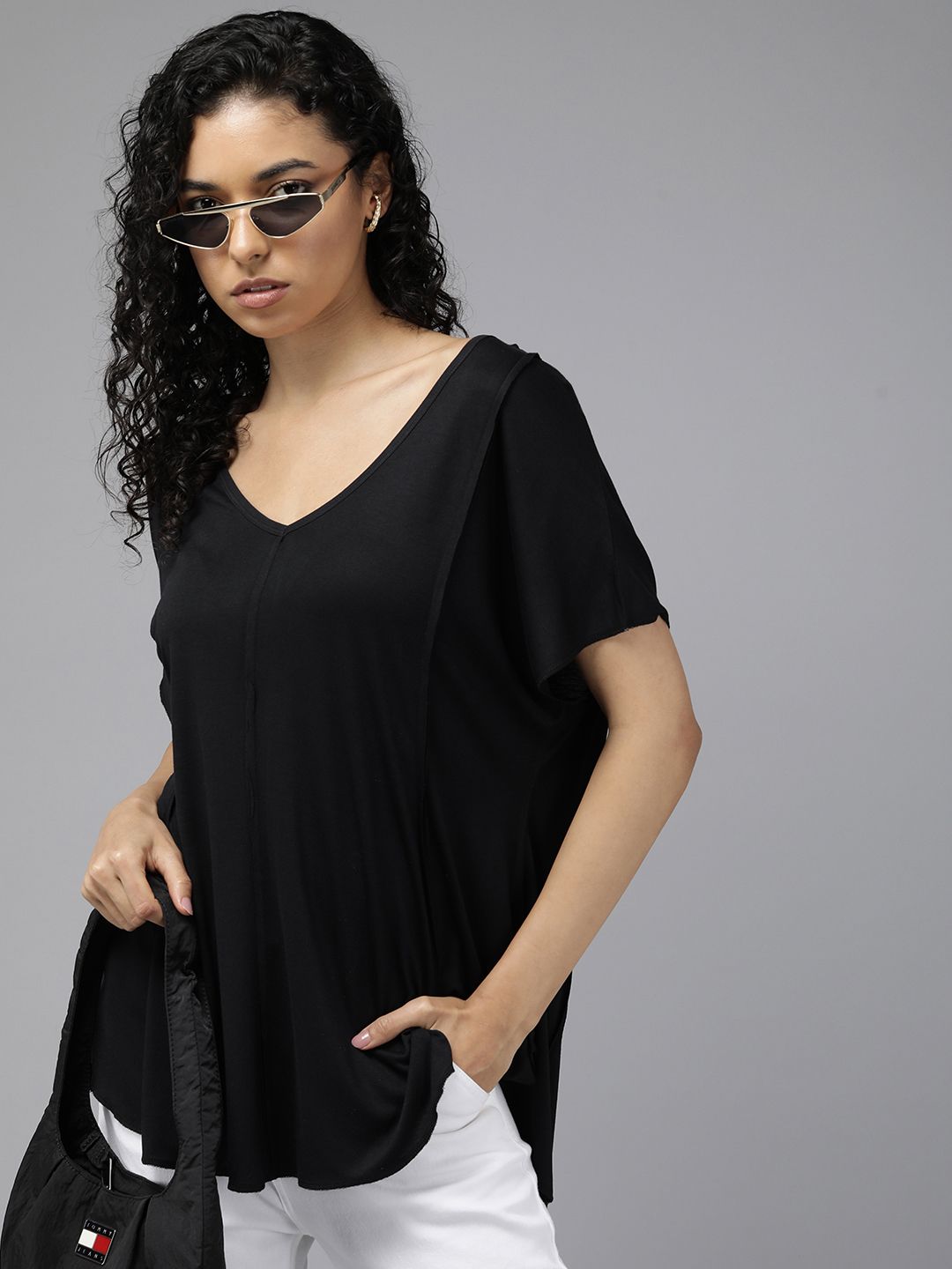 The Roadster Lifestyle Co. Solid Extended Sleeves Top Price in India