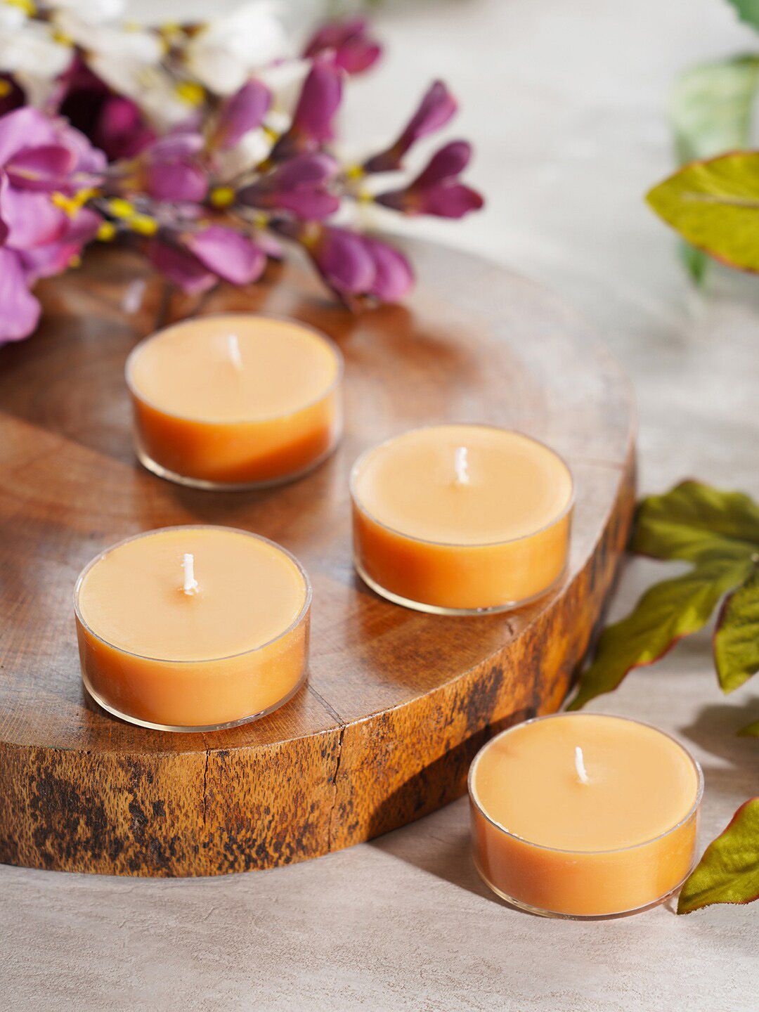 Pure Home and Living Set Of 4 Yellow Solid Big Tealight Candles Price in India