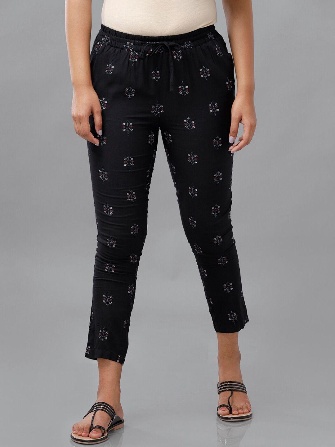 De Moza Women Black Floral Printed Trousers Price in India