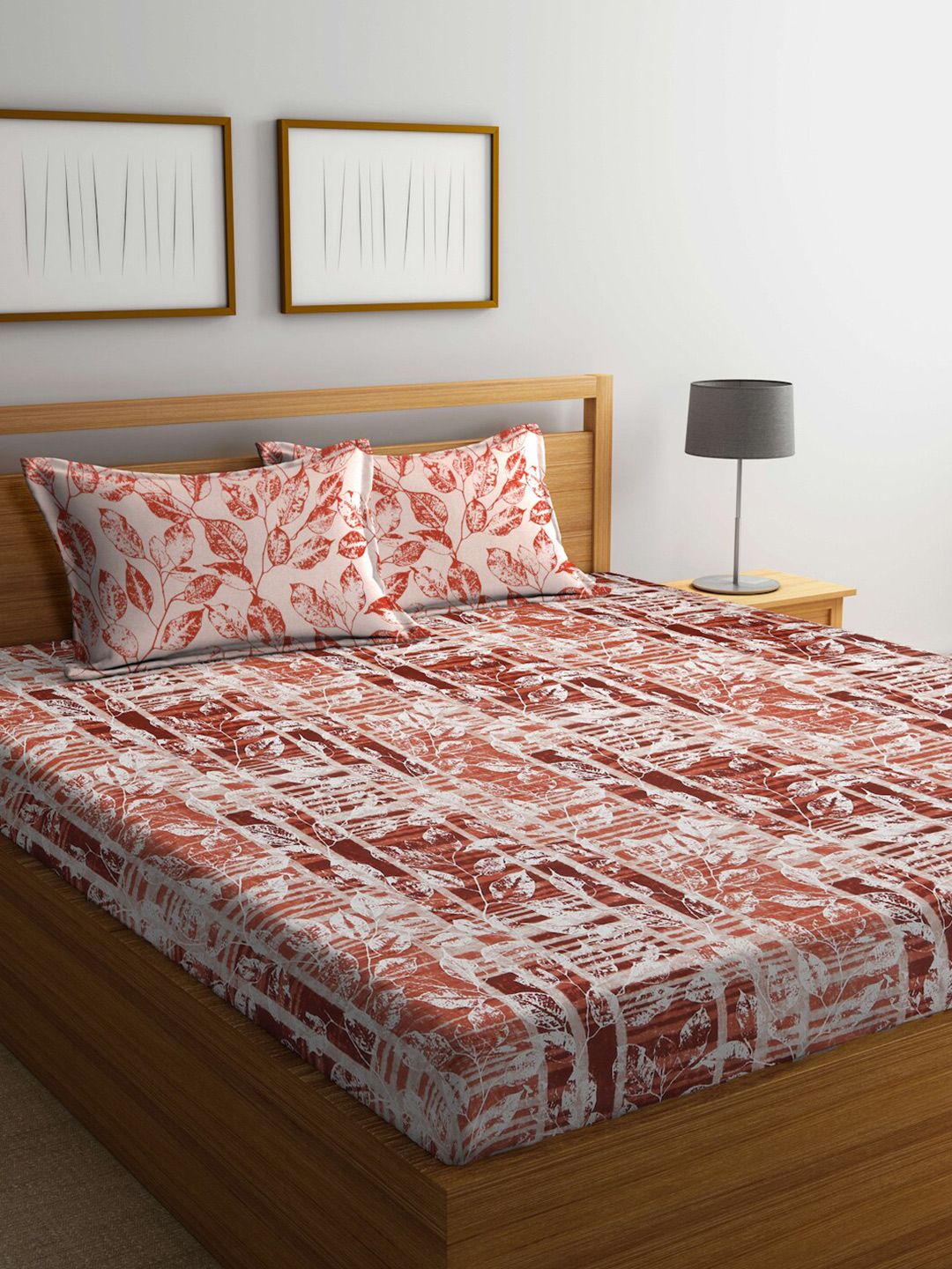 BOMBAY DYEING Orange & White Floral 140 TC Cotton Queen Bedsheet with 2 Pillow Covers Price in India