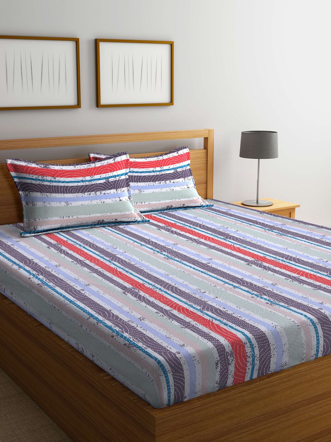 BOMBAY DYEING Purple & Red Striped 120 TC Queen Bedsheet with 2 Pillow Covers Price in India