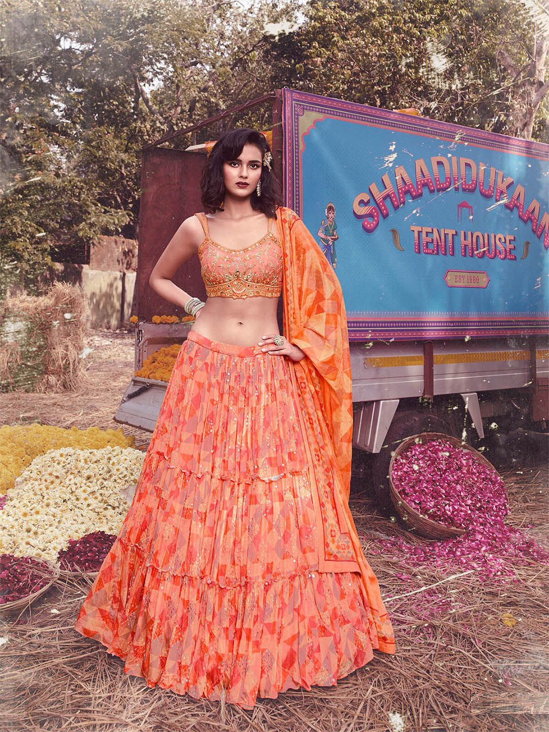 ODETTE Peach-Coloured & Orange Embroidered Semi-Stitched Lehenga Choli Set Price in India