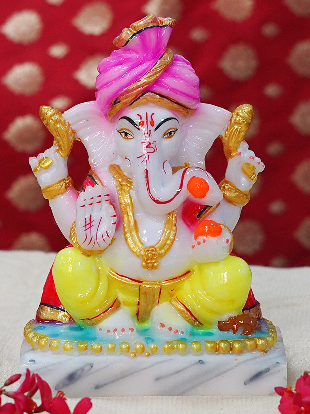 Gallery99 Yellow & Pink Textured Lord Ganesha Showpieces Price in India