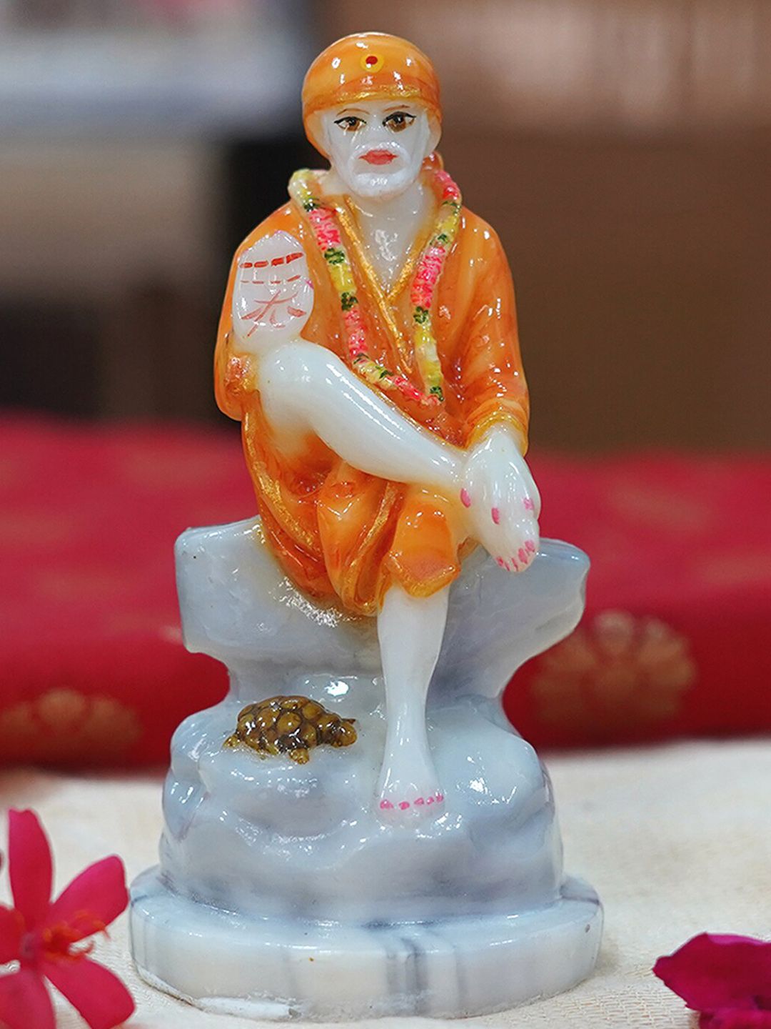 Gallery99 Orange Printed Marble Showpieces Price in India