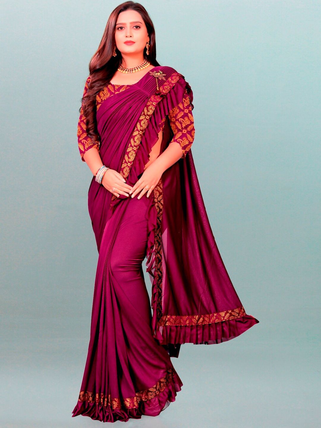 APNISHA Women Brown & Gold-Toned Solid Embroidered Lycra Saree Price in India