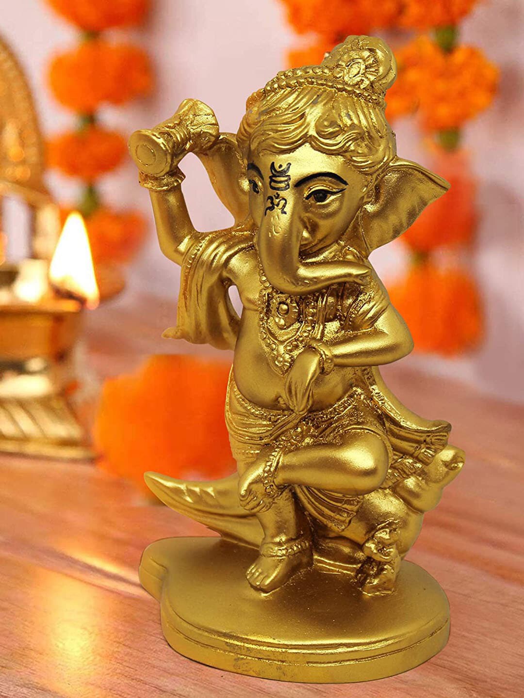 TIED RIBBONS Gold-Toned Solid Ganesh Showpieces Price in India