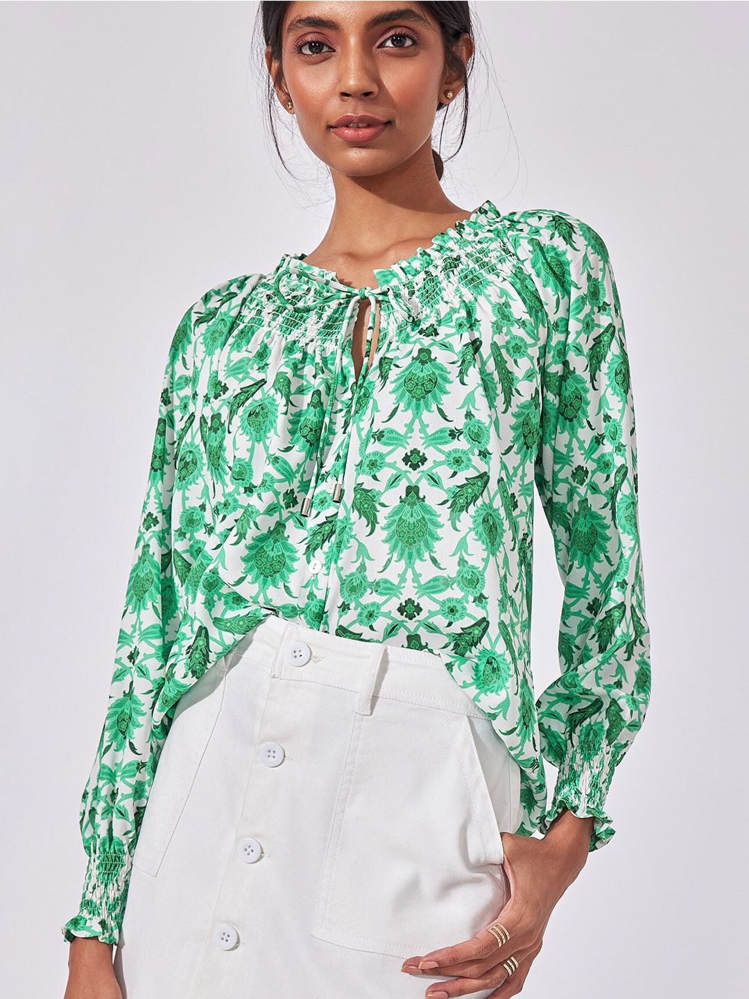 The Label Life Green & White Leaf Print Tie-Up Neck Crepe Top Price in India