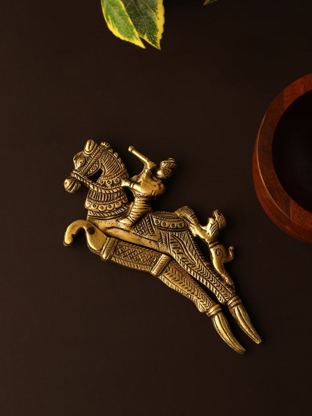 Amoliconcepts Gold-Toned Horse rider Nutcracker Showpieces Price in India