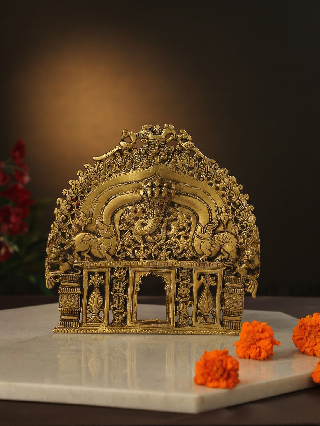 Amoliconcepts Gold-Toned Bhujang Design Prabhavali Showpieces Price in India