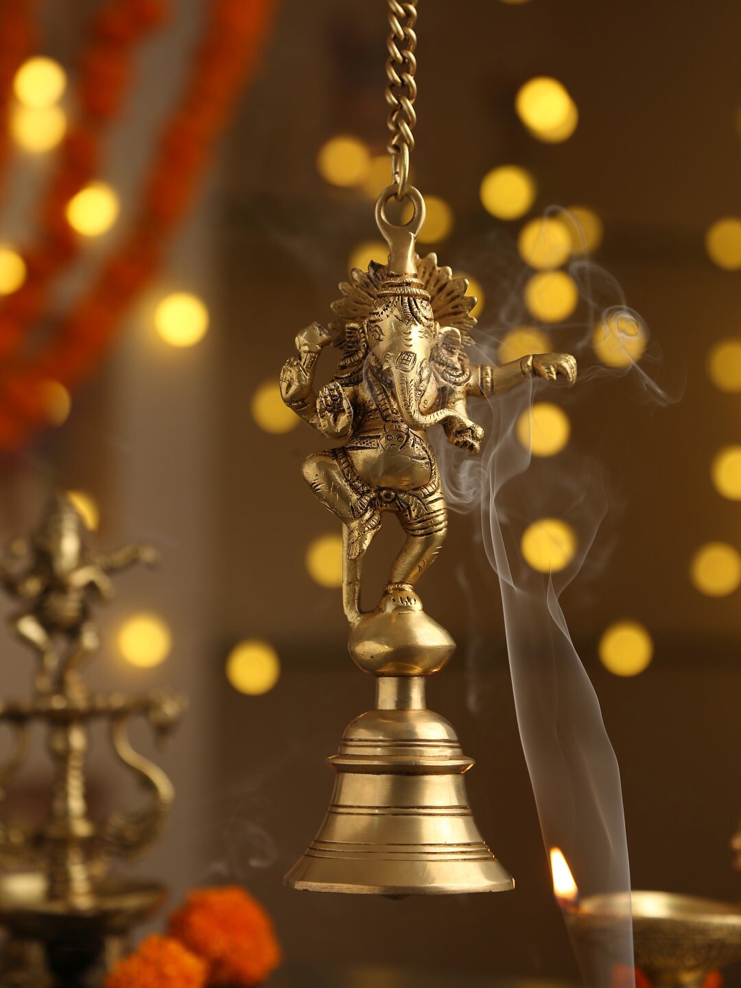 Amoliconcepts Gold-Toned Dancing Ganesha bell with chain Price in India