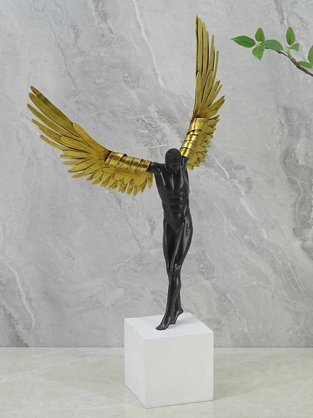 HomeTown Black & White Willow Polyresin Angel With Wings Showpiece Price in India