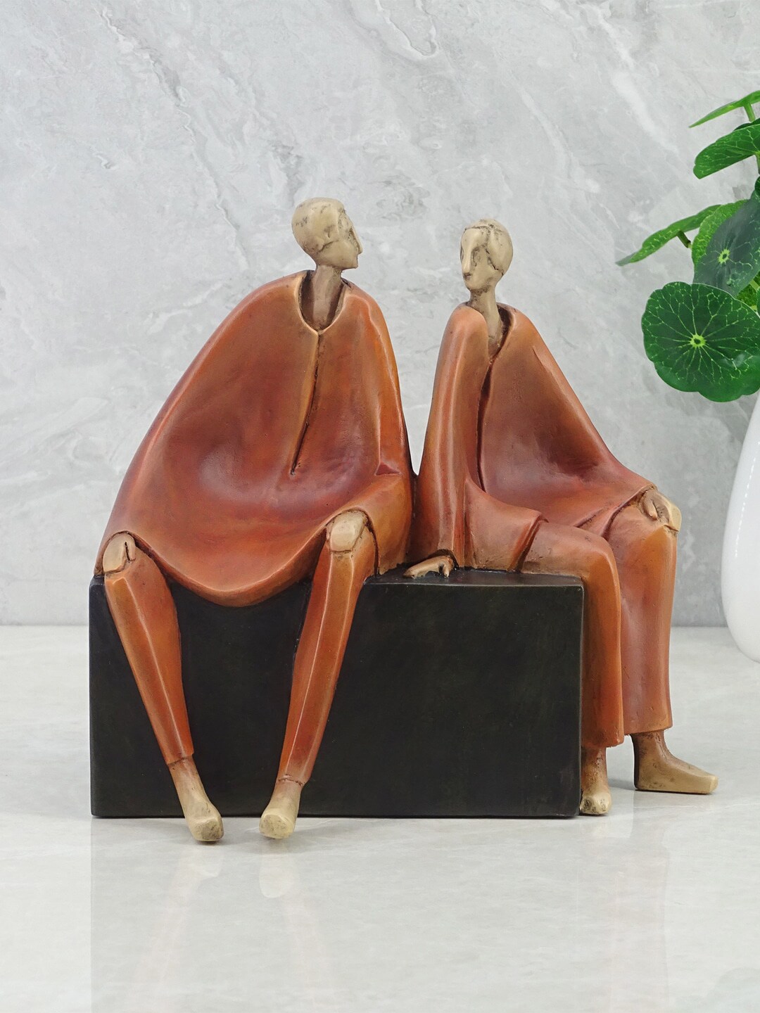 HomeTown Unisex Brown & Black Polyresin Figurine Showpieces Price in India